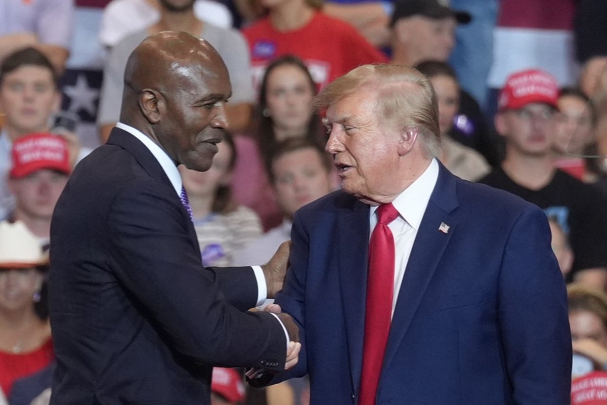 Trump praises supporter who punched heckler at rally and compares him to Evander Holyfield: ‘That was great’