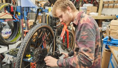 Oscar Huckle adjusting gears on Microsoft Sword in the workshop
