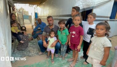 Dalal al-Dahdouh (L) and her family in Gaza City, northern Gaza