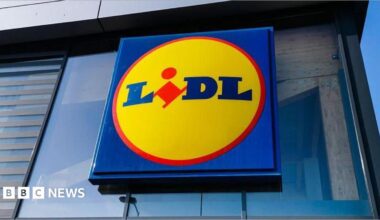 A red, yellow and blue shop sign that reads Lidl