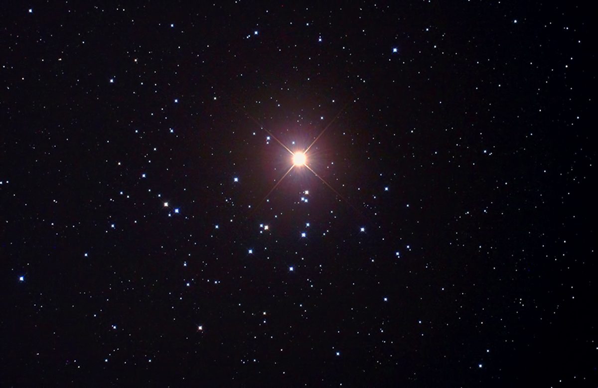 Mars passing across the Beehive Cluster in October 2011, imaged through a f/3.3 reflector. Credit: Pete Lawrence