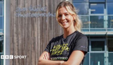 Becky North smiles outside Sport Wales in Cardiff