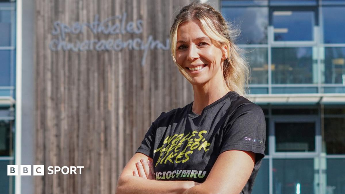 Becky North smiles outside Sport Wales in Cardiff