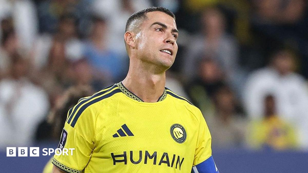Cristino Ronaldo playing in a yellow Al-Nassr top
