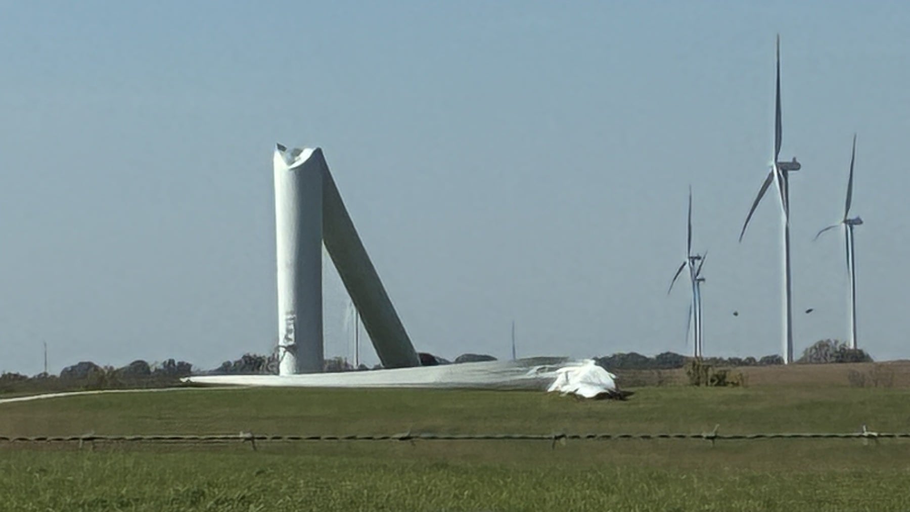 A 499-foot wind turbine folded in half into a Missouri pasture after two loud noises at 4 in the morning, the fifth tower to go down at the state’s biggest wind farm, and photos taken that afternoon show three of its neighbors spinning beside the stump
