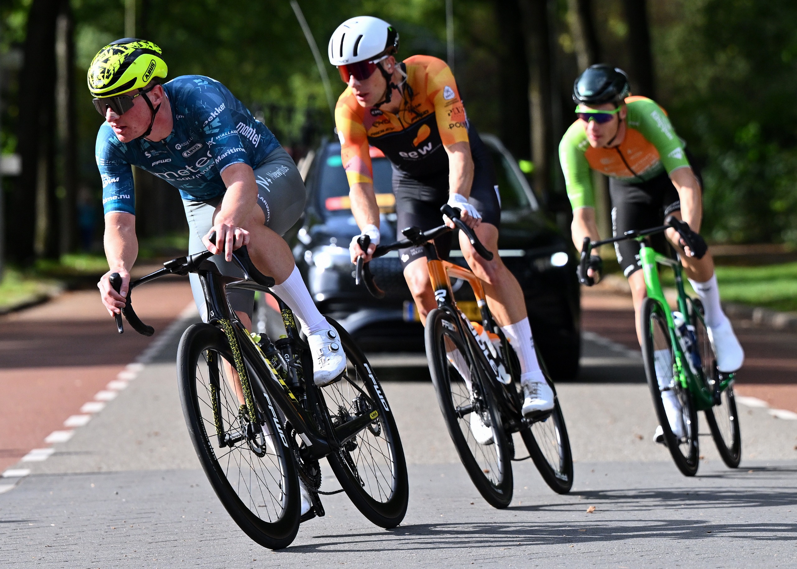 Johan Dorussen of Metec - SOLARWATT p/b Mantel, Rick Ottema of EEW-VDK Cyclingteam and Luke Verburg of Azerion / Villa Valkenburg compete in the breakaway