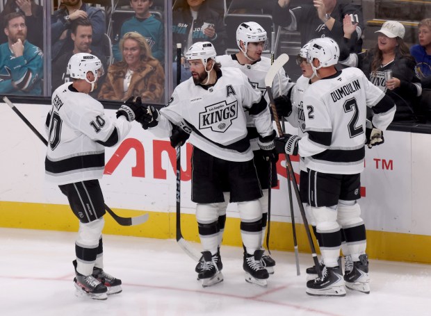 Los Angeles Kings' Drew Doughty #8 celebrates his goal with Corey Perry, #10 Brian Dumoulin #2 and other teammates in the second period of their NHL game against the San Jose Sharks at the SAP Center in San Jose, Calif., on Tuesday, Oct. 28, 2025. (Jane Tyska/Bay Area News Group)