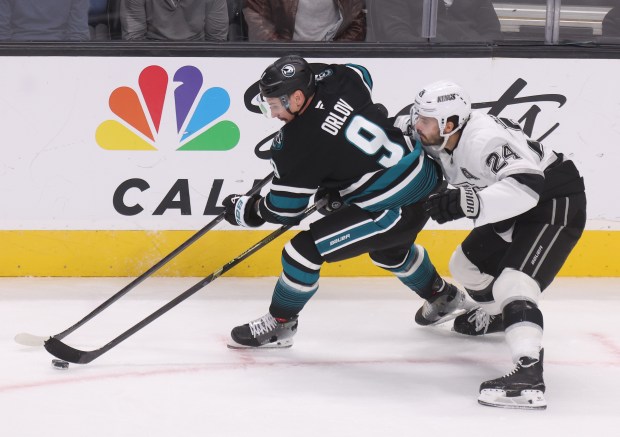 San Jose Sharks’ Dmitry Orlov #9 and Los Angeles Kings’...