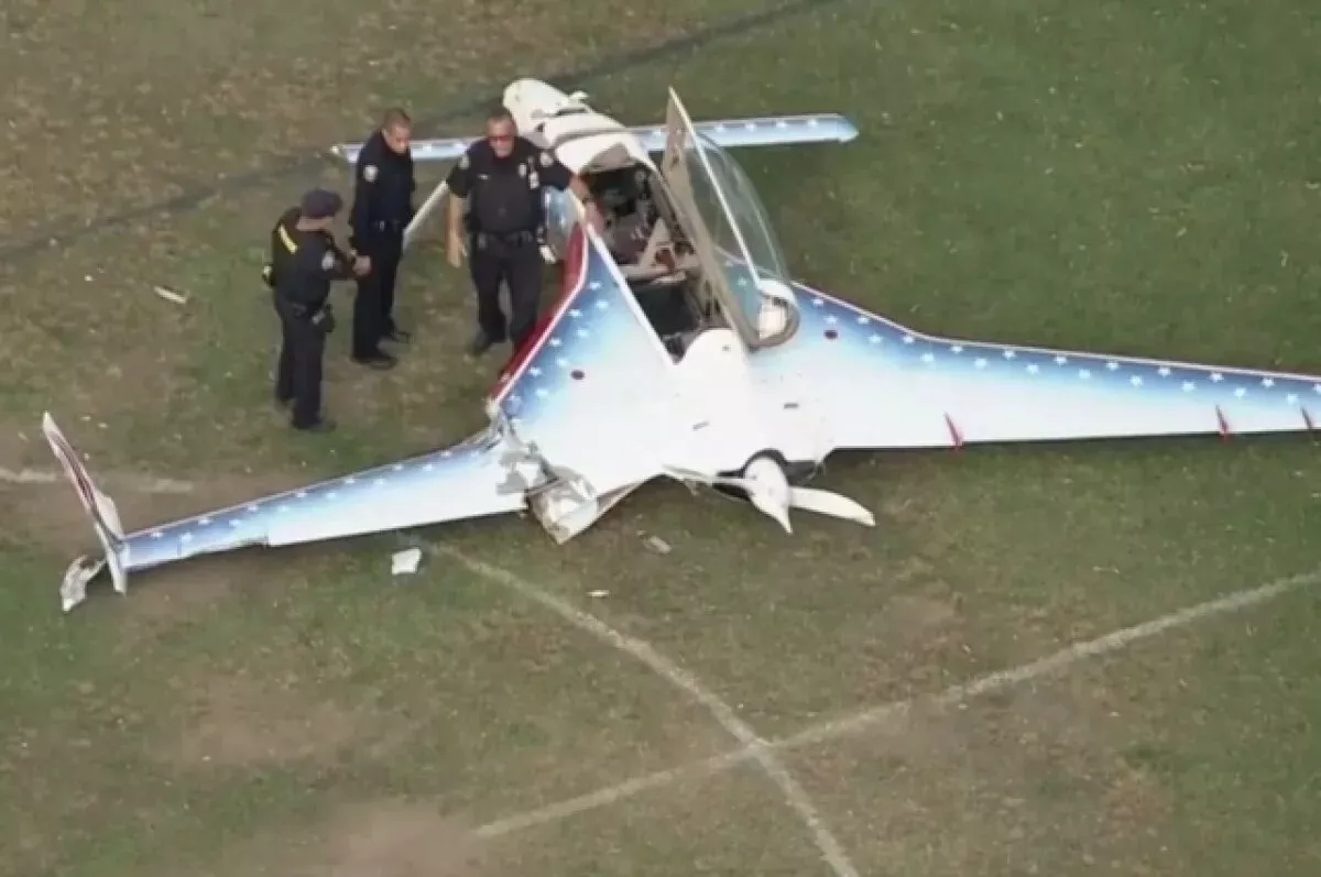 Emergency landing in busy park leaves two injured in California