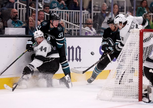 San Jose Sharks’ Collin Graf #51 and Los Angeles Kings’...