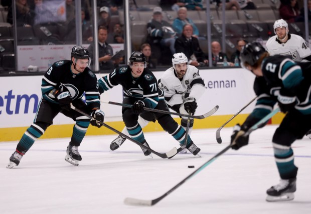San Jose Sharks’ Dmitry Orlov #9 and Macklin Celebrini #71...
