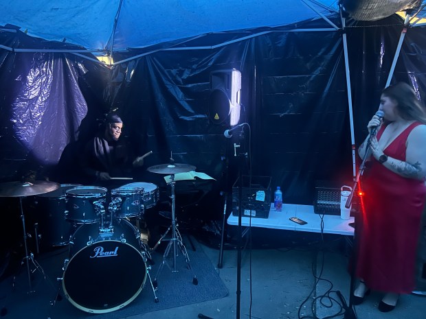 As guests waited to go through CityHeART’s haunted house, they...