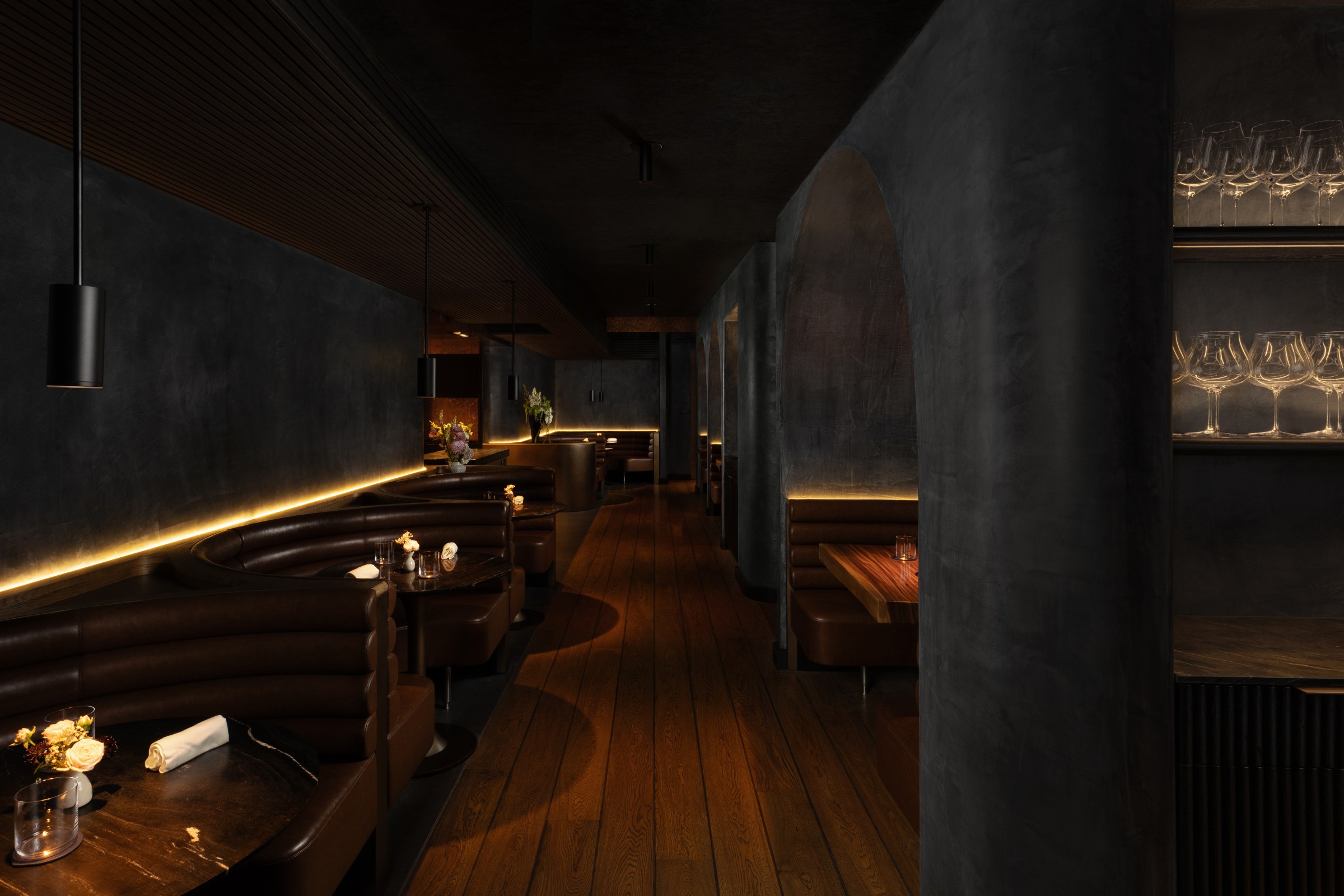 The dining room is lined with cognac-colored leather booths.