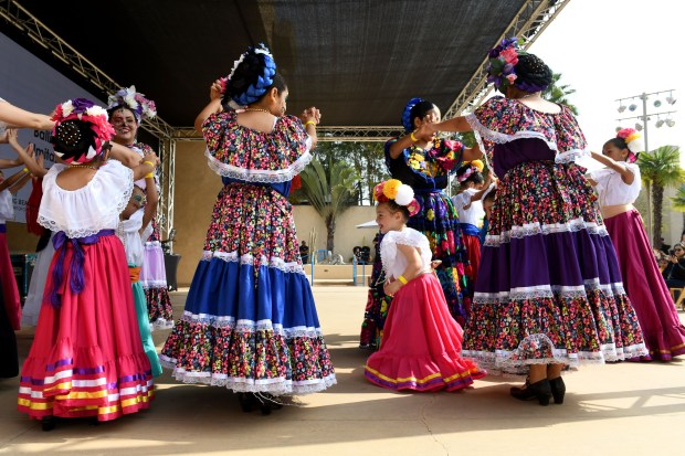 The Ballet Folklórico Almitas Mexicanas performs during the Día de...