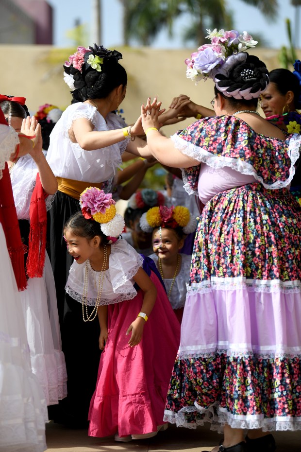 The Ballet Folklórico Almitas Mexicanas performs during the Día de...