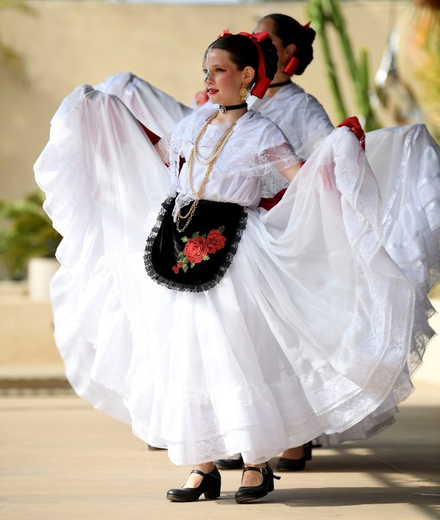 The Ballet Folklórico Almitas Mexicanas performs during the Día de...