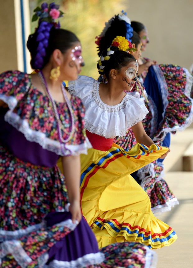 The Ballet Folklórico Almitas Mexicanas performs during the Día de...