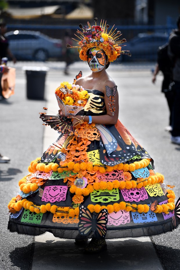 Monique Cominy attends the Día de los Muertos festival at...