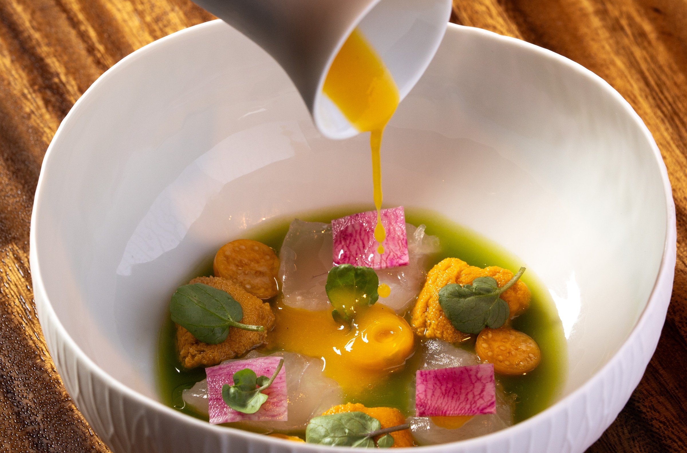 Spiny lobster aquachile with uni and passionfruit.