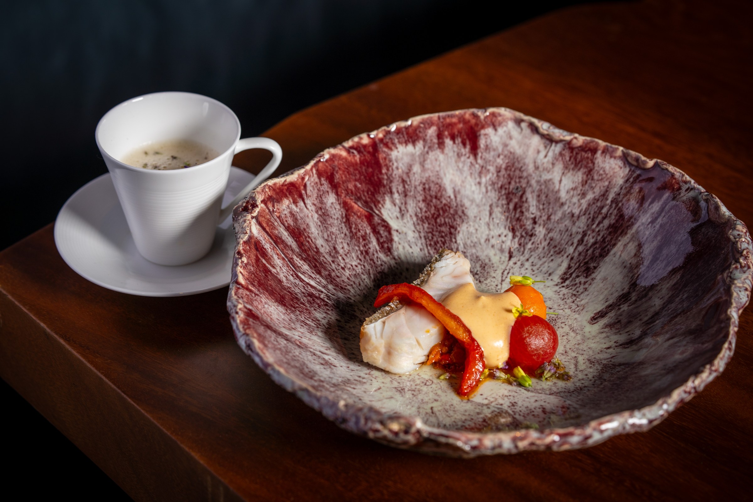 A dish on one of the hand-thrown plates at Lucien.