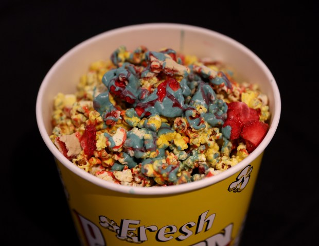 Popcorn with dried strawberries are served during the “Taste of...