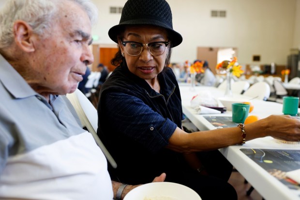 Ginnie Reyes, right, chats with her husband Luis at the Sunnyvale Senior Nutrition Program at the Sunnyvale United Methodist Church in Sunnyvale, Calif., on Thursday, Oct. 9, 2025. (Nhat V. Meyer/Bay Area News Group)