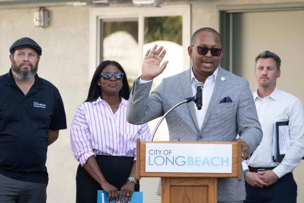 Mayor Rex Richardson speaks during the ribbon cutting ceremony for...