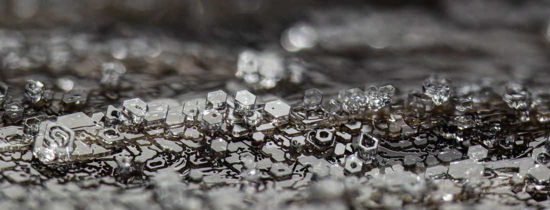 Frost on a wooden railing