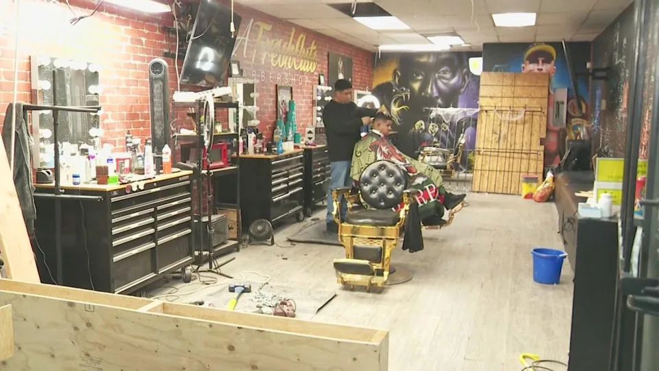 Devoted clients are stopping by LA Fresh Cuts to support owner Joe Gomez during this tough time. (KTLA)