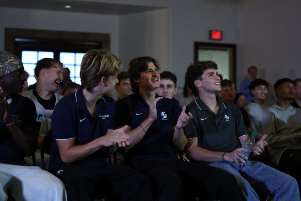 USD men's soccer players react to seeing their name called in the NCAA Tournament selection show last Monday. The Toreros are the No. 9 overall seed. (Thomas Christensen / USD Athletics.)