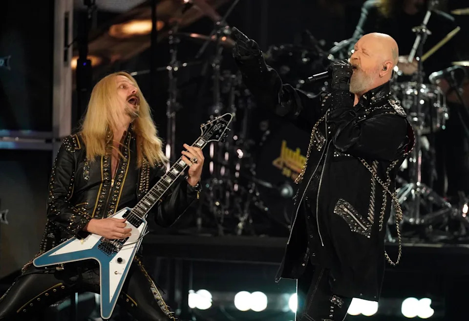 Inductees Richie Faulkner, left, and Rob Halford of Judas Priest perform during the Rock & Roll Hall of Fame Induction