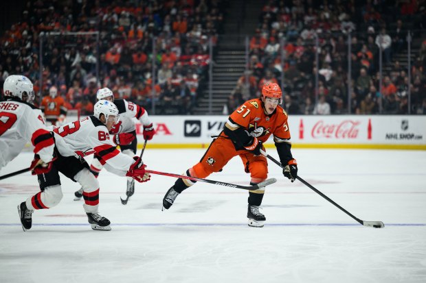 Ducks defenseman Olen Zellweger (51) passes the puck while under...