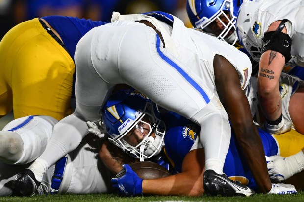 San Jose State's Steve Chavez-Soto (15) is stopped from getting a first down while playing Air Force in the fourth quarter of their game at San Jose State University in San Jose, Calif., on Saturday, Nov. 8, 2025. Air Force defeated San Jose State 26-16. (Jose Carlos Fajardo/Bay Area News Group)