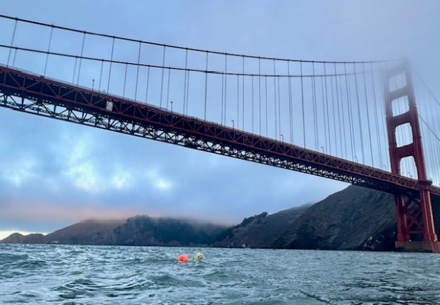 Kathie Hewko of Petaluma completes her 95th Golden Gate Bridge swim in October 2025. (Courtesy of Kathie Hewko)