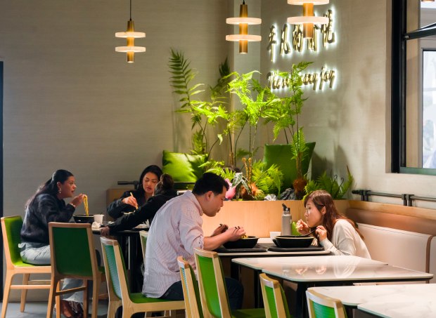 Customers dine at Tang Bar at the Brea Mall in...