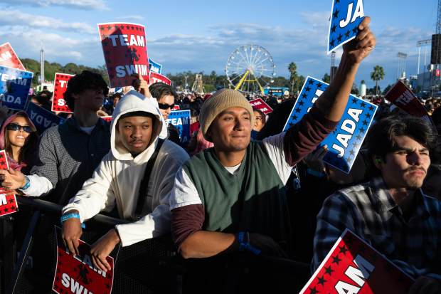 Fans of PartyOf2 watch their performance on the Camp stage...