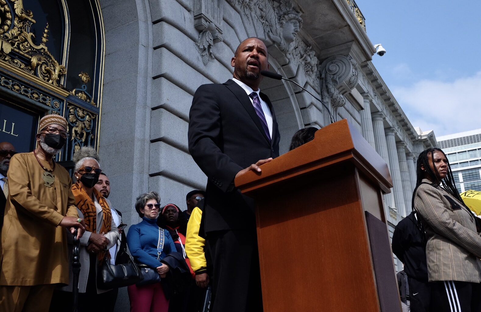 Supervisor Shamann Walton addresses the public at the reparations rally on Tuesday.