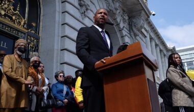 Supervisor Shamann Walton addresses the public at the reparations rally on Tuesday.
