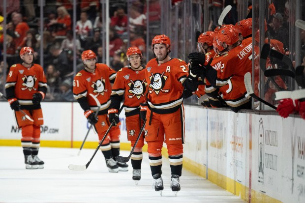 Ducks center Mason McTavish (23) celebrates his goal with the...