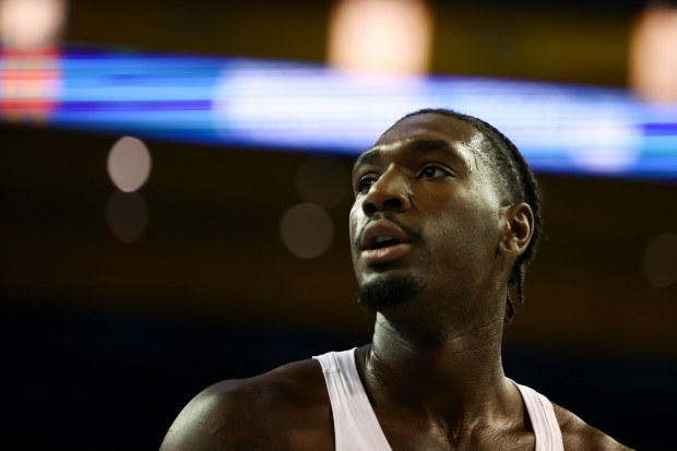 UCLA forward Eric Dailey Jr. looks on before an NCAA...