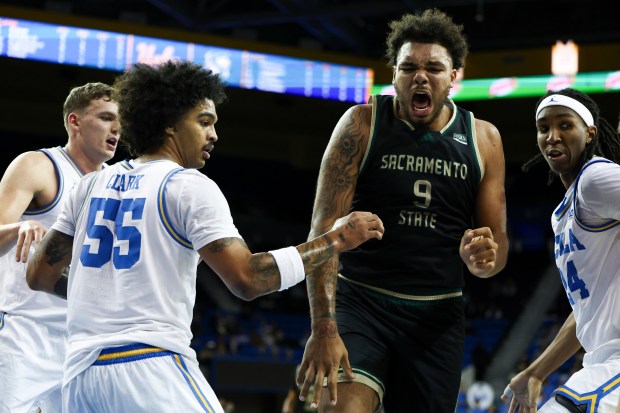 Sacramento State forward Jeremiah Cherry (9) reacts after an injury...