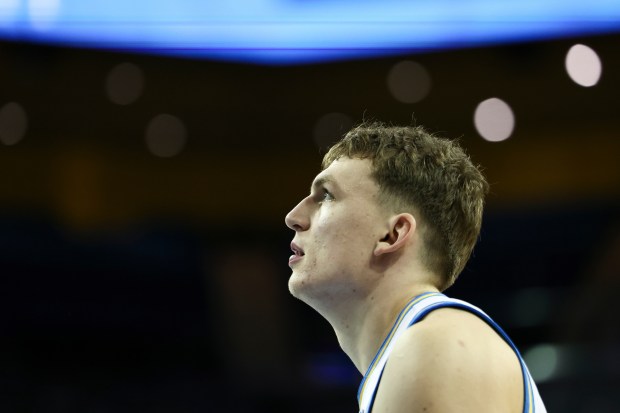 UCLA forward Tyler Bilodeau looks on before an NCAA college...