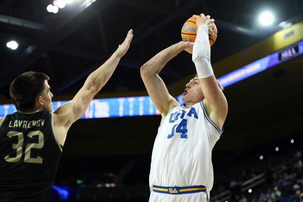 UCLA forward Tyler Bilodeau (34) shoots against Sacramento State forward...