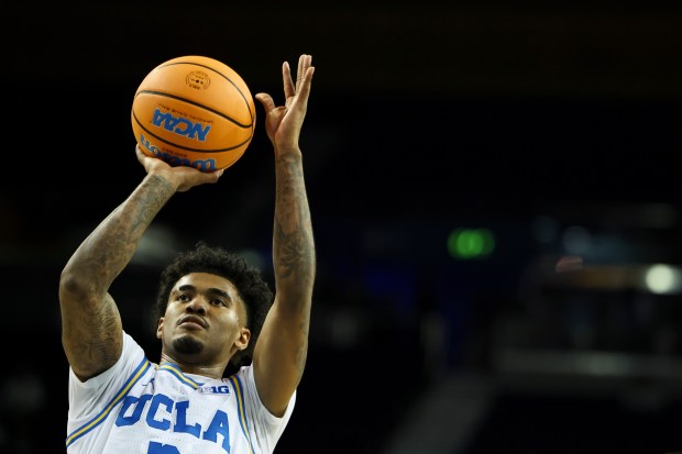 UCLA guard Donovan Dent (2) shoots a free throw during...
