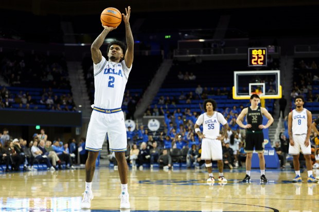 UCLA guard Donovan Dent (2) shoots a free throw during...
