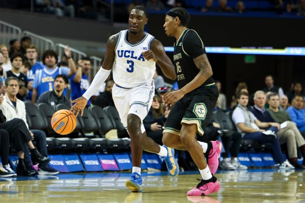 UCLA forward Eric Dailey Jr. (3) dribbles against Sacramento State...