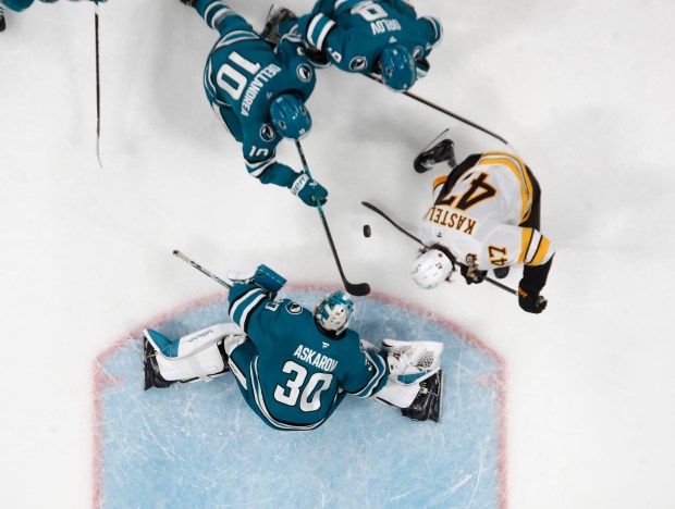 San Jose Sharks goaltender Yaroslav Askarov (30) blocks the puck...