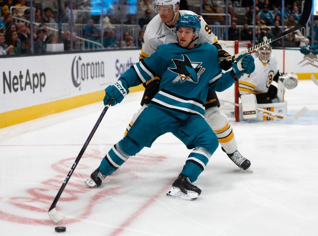 San Jose Sharks’ William Eklund (72) controls the puck against...