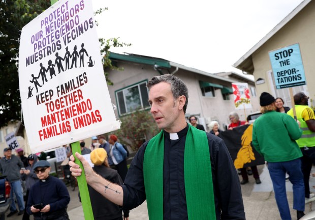 Associate Pastor for Justice and Outreach Drew Paton, of the...