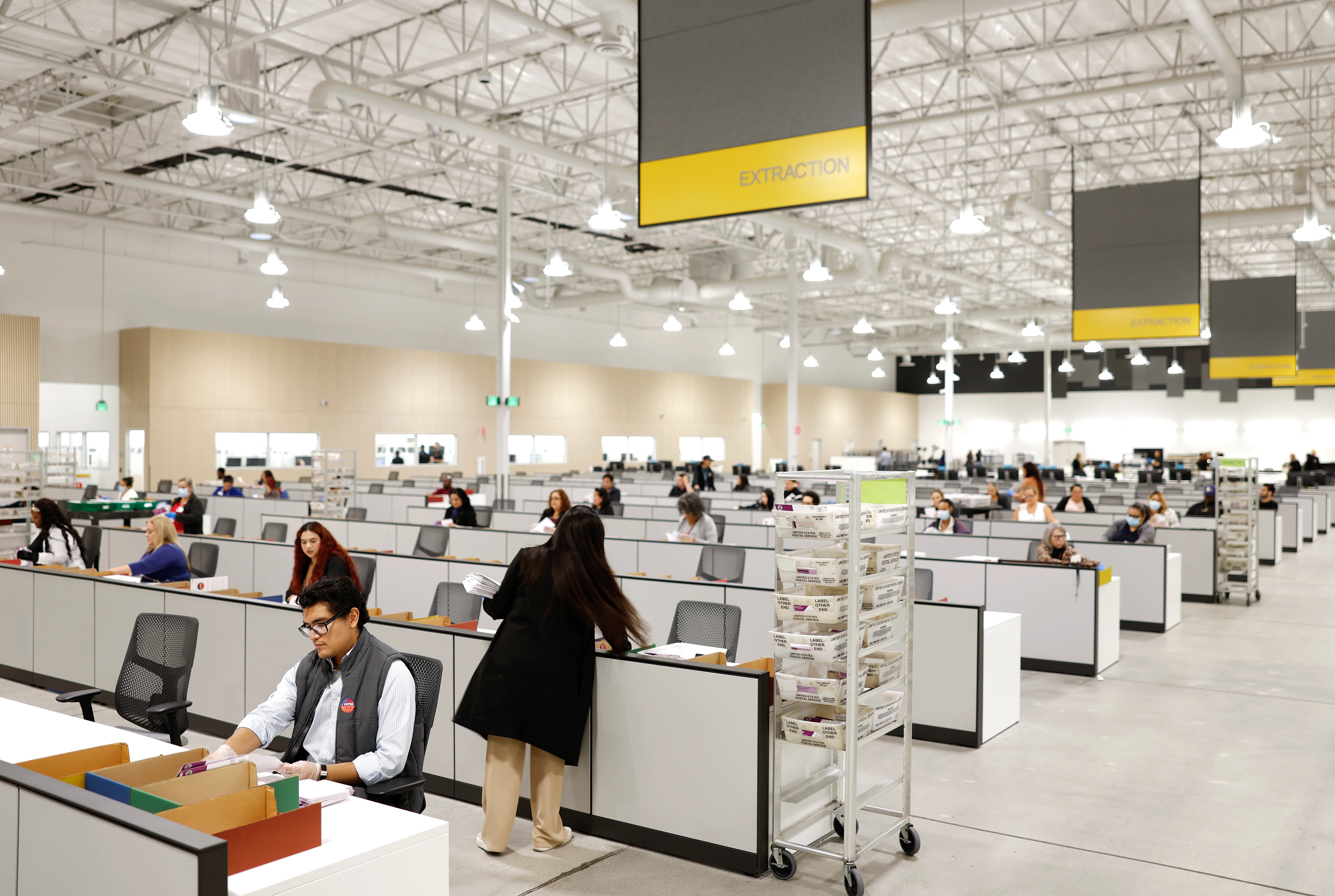 CITY OF INDUSTRY, CALIFORNIA – NOVEMBER 04: Election workers process ballots at the Los Angeles County Ballot Processing Center on November 04, 2025 in City of Industry, California. California voters are deciding whether to approve Proposition 50, a measure that would replace the state’s current congressional district map with new, legislature-drawn lines from 2026 through 2030. The proposition was put forward as a response to Republican-controlled states redrawing their own maps to create an electoral advantage in the 2026 midterms. (Photo by Mario Tama/Getty Images)